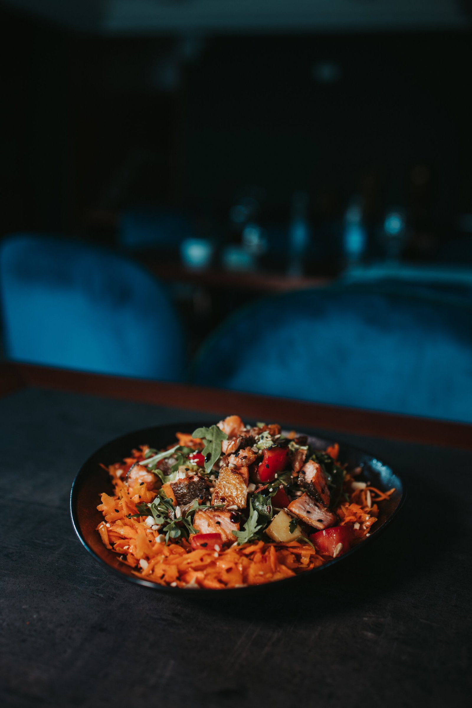 a vertical shot of fried fish and carrot salad on 2025 10 17 08 04 07 utc